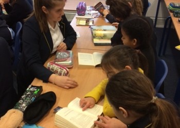 Primary and Secondary students read together for World Book Day!